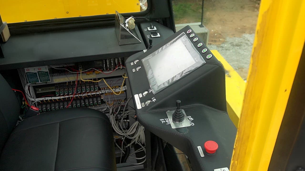 Engineers assembling custom industrial machinery